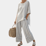 Fiorella | Blouse asymétrique élégante et pantalons rayés