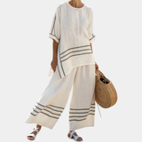 Vittorina | Haut asymétrique à rayures sophistiqué et pantalons audacieux