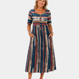 Wendoline | Robe midi élégante à rayures