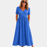 Adriennette | Robe avec décolleté en V croisé et poches