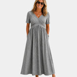 Adriennette | Robe avec décolleté en V croisé et poches