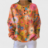 Franziska - Pull orange à motif floral multicolore