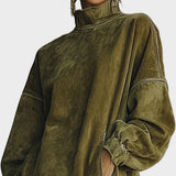 Robe en suédine avec col roulé et franges