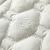 Briseida | Long manteau en duvet avec capuche