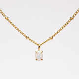 Marion | Collier en perles dorées avec pendentif en opale